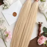 Enyhén hamvas platina szőke tincses 50-53cm 100% eredeti emberi haj/ 10gr