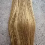 Melírozott mézes szőke 100% emberi hajból készült csatos haj kb. 110-115 gr 50 cm