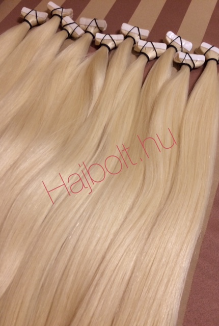 Platina szőke tape-in (ragasztócsíkos) eredeti haj 60-65 cm/ 1 pár (2db)
