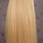 Méz szőke 100% emberi hajból készült csatos haj kb. 110-115 gr 70 cm